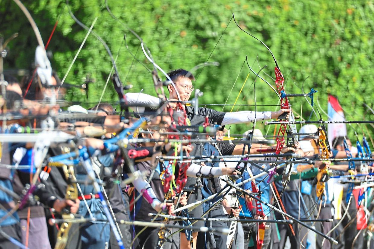 Participants from the youth open recurve team event.