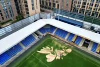 Soccer-'I thought it was AI,' says Wimbledon director of flooding images at stadium
