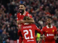Soccer-Salah sparkles as Liverpool beat Bologna 2-0