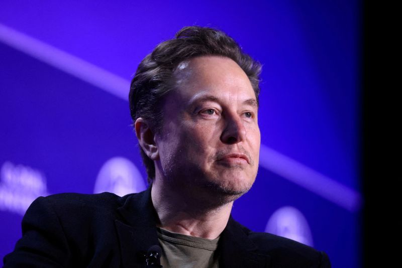 FILE PHOTO Elon Musk Chief Executive Officer of SpaceX and Tesla and owner of X looks on during the Milken Conference 2024 Global Conference Sessions at The Beverly Hilton in Beverly Hills California U.S. May 6 2024.  REUTERSDavid SwansonFile Photo
