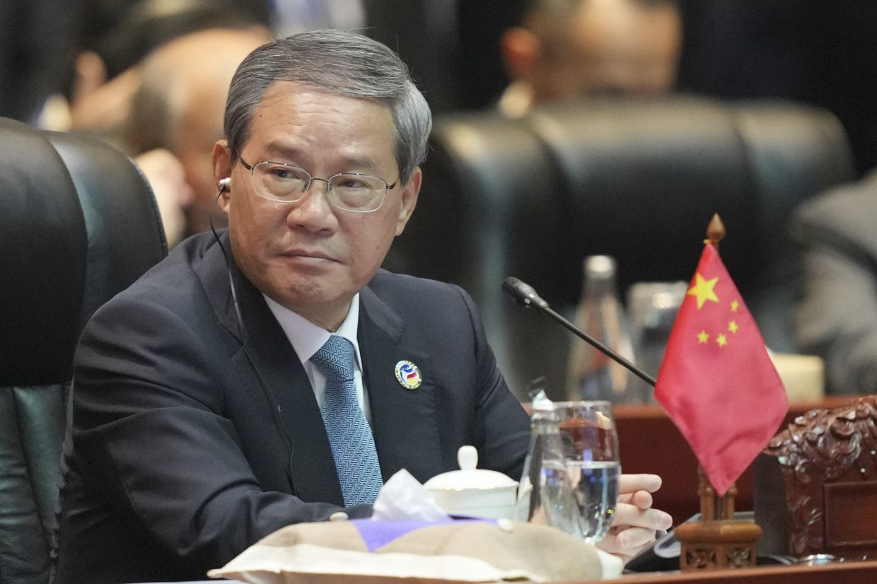 China ready to join Laos in building high-level community with shared ...