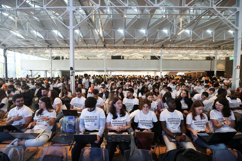 Students participate in an event to attempt to break the Guinness Record for the worlds largest computer programming lesson at a university in Lisbon Portugal October 12 2024. REUTERSRodrigo Antunes