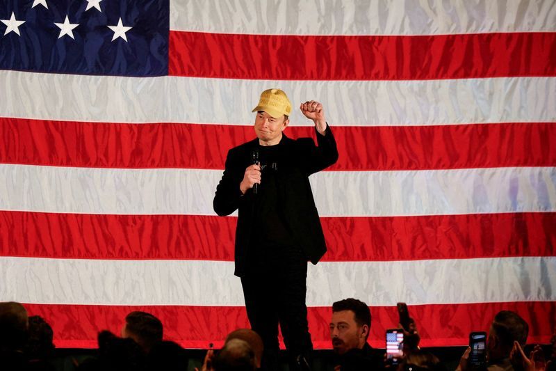FILE PHOTO Tesla CEO and X owner Elon Musk who supports Republican presidential nominee former U.S. President Donald Trump gestures as he speaks about voting during an America PAC Town Hall in Folsom Pennsylvania U.S. October 17 2024. REUTERSRachel WisniewskiFile Photo
