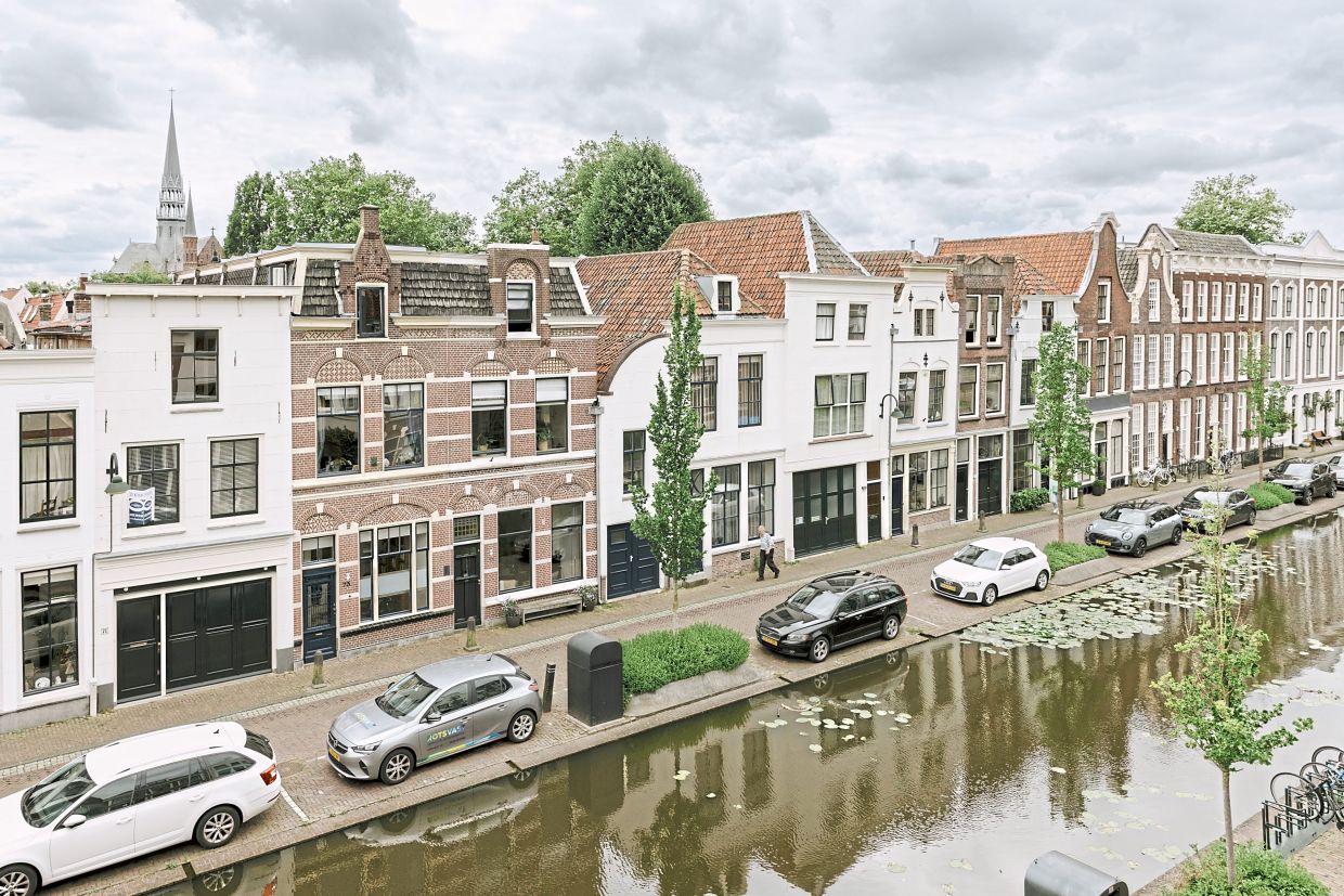 Along central street Turfmarkt, water is bare inches from the top of canal wall in Gouda. — ©2024 The New York Times Company