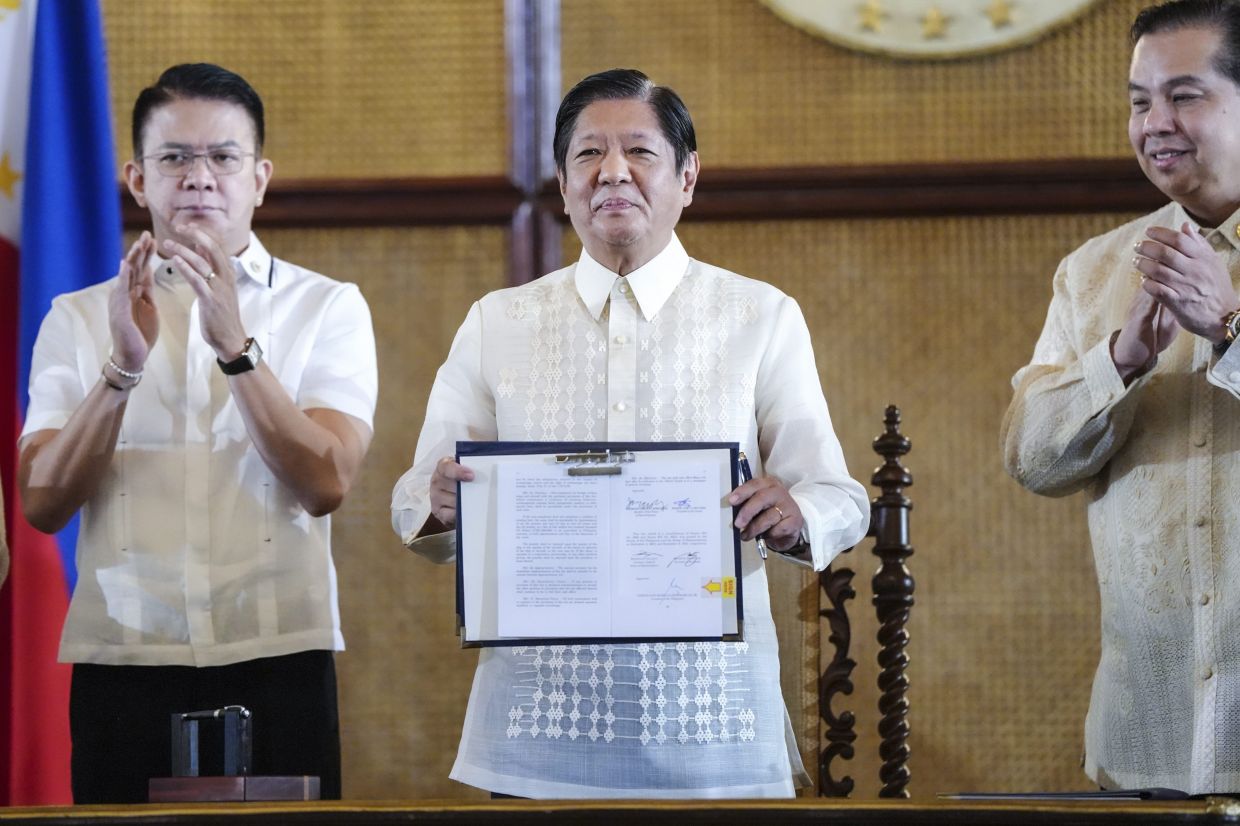 Marcos Sign Marcos signs laws on Philippine Sea rights but immediately draws China ...