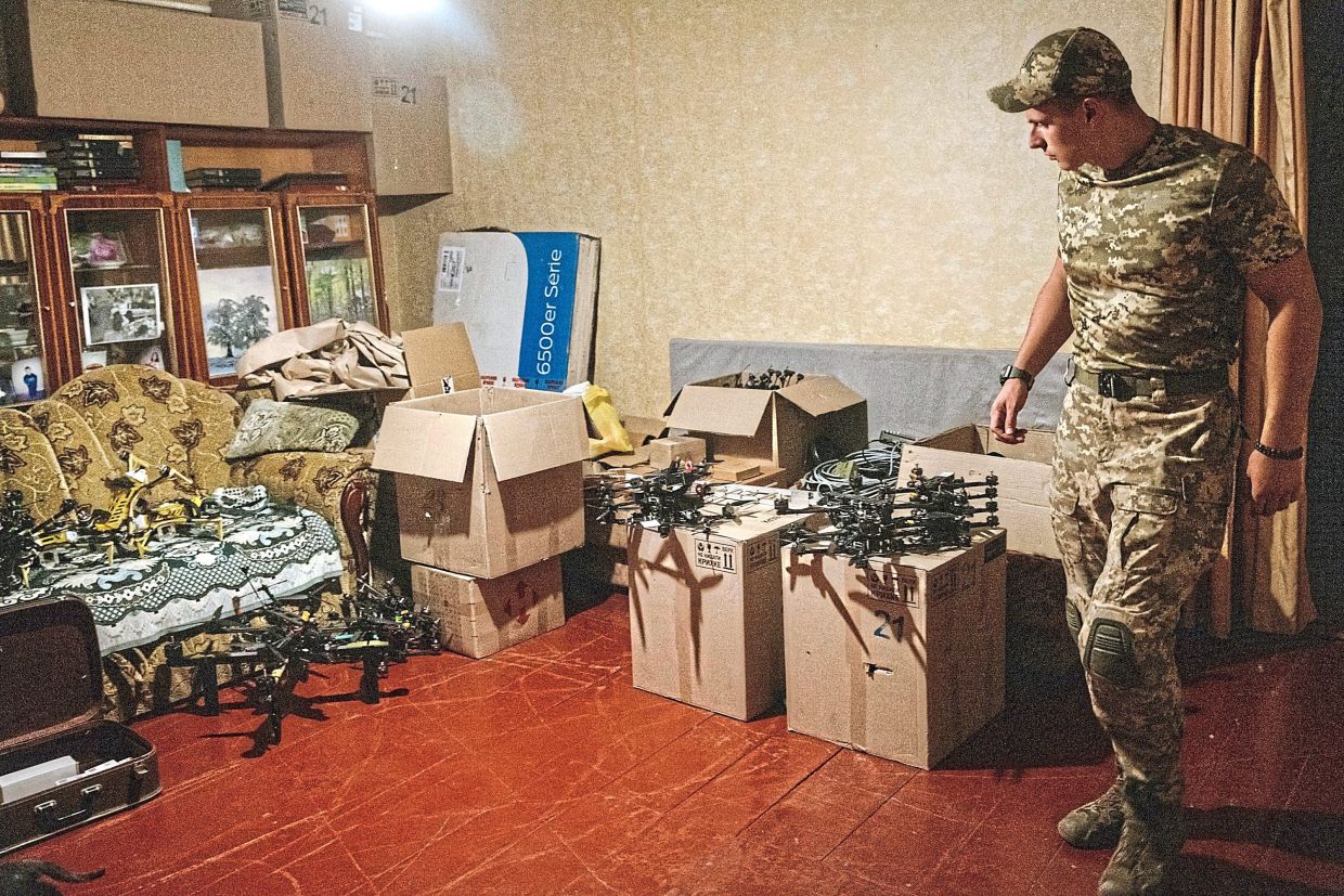 A Ukrainian soldier checking new drones in Donetsk, Ukraine.  — ©2024 The New York Times Company
