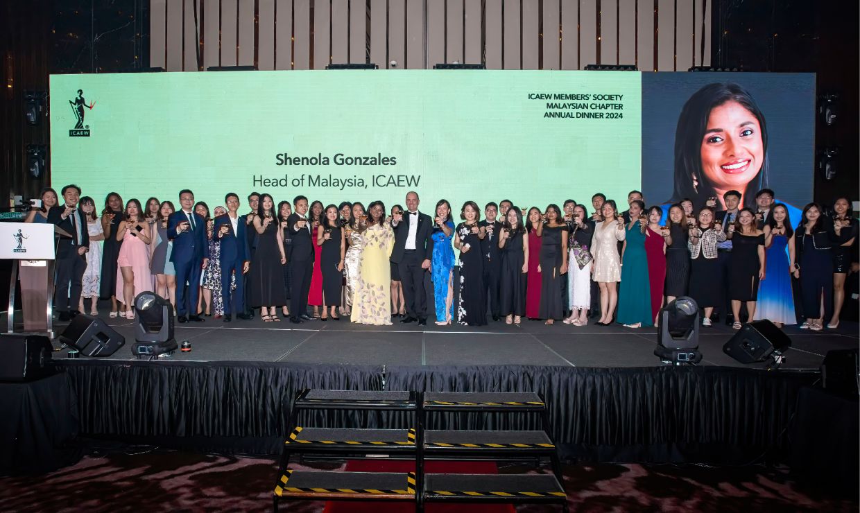 New ICAEW members recognised on stage at the annual dinner.