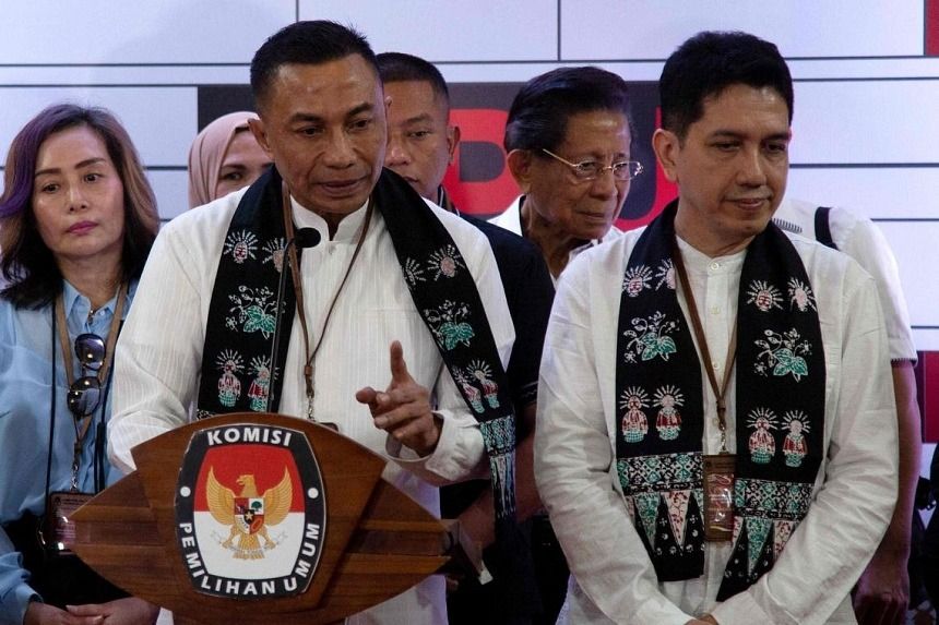  Dharma Pongrekun (left) and his running mate Kun Wardana attending a press conference after registering as Jakarta gubernatorial candidates. - AFP