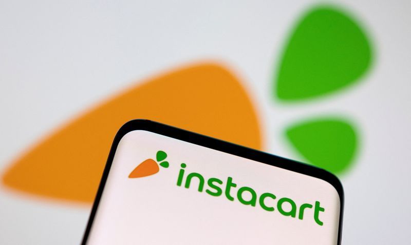 FILE PHOTO Smartphone with displayed Instacart logo is seen in this illustration taken March 25 2022. REUTERSDado RuvicIllustrationFile Photo