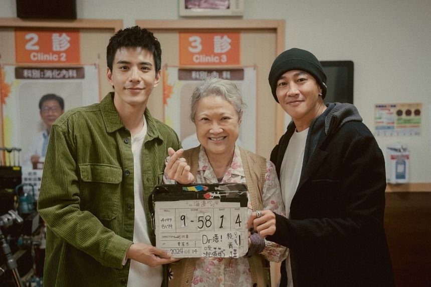 Singaporean actress Hong Huifang (centre) with co-star Charles Lin (left) and director Peter Ho on the set of Taiwanese drama Breeze By The Sea. - DEEPWATERS DIGITAL SUPPORT