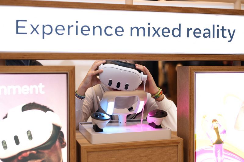 FILE PHOTO A child tries on a Meta Quest headset at the John Lewis retail store on Oxford Street in London Britain October 24 2024. REUTERSHollie AdamsFile Photo