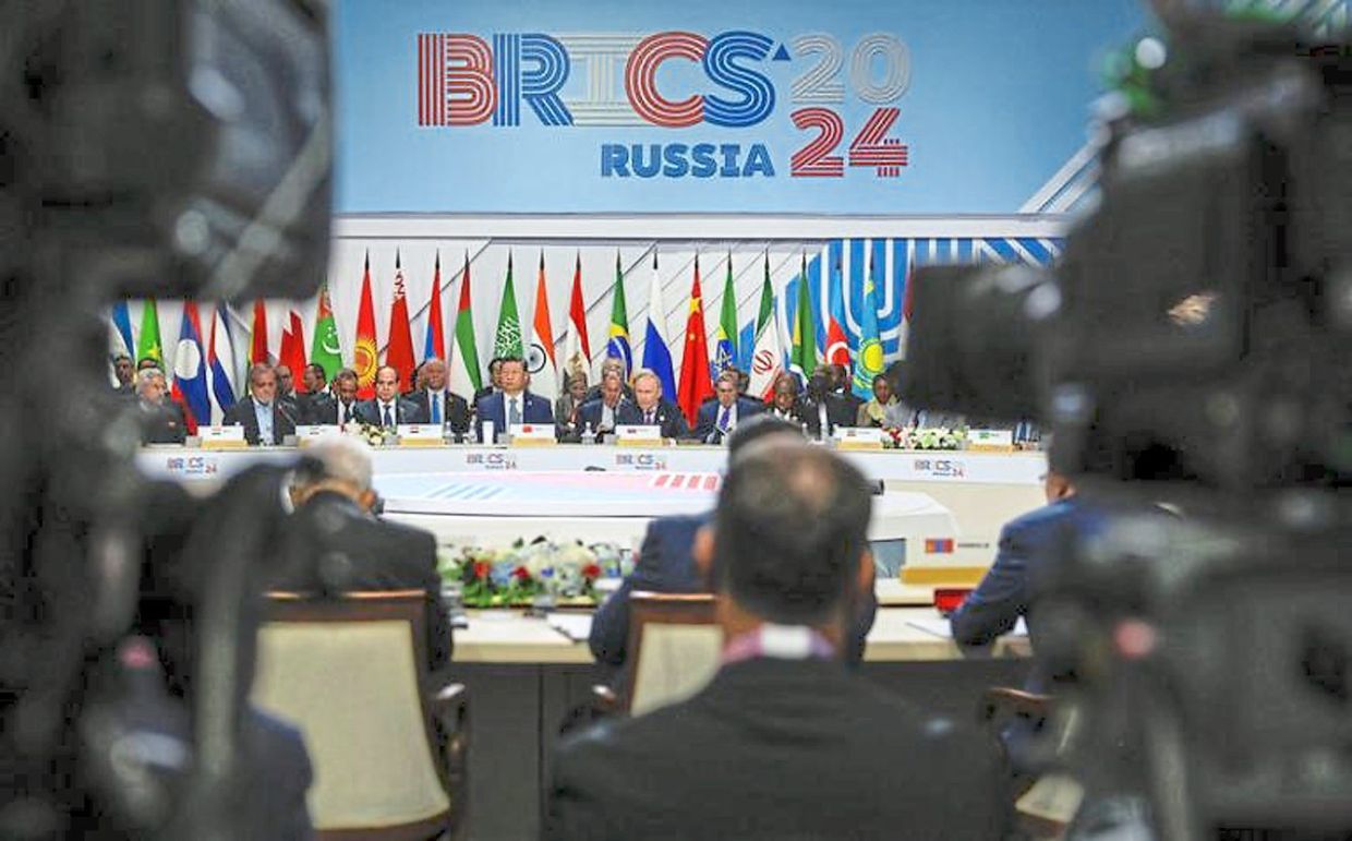 Standing united: Officials, including Russian President Vladimir Putin, Chinese President Xi Jinping and Egyptian President Abdel Fattah al-Sisi, at the BRICS summit in Kazan, Russia, in October. Malaysia aims to connect the Global South and Asean through BRICS for economic growth. — Reuters