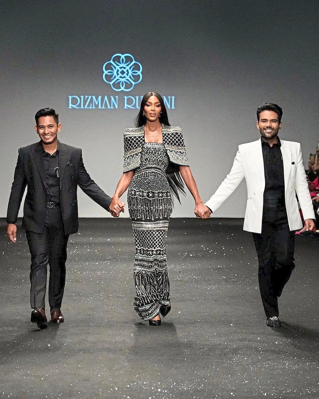 Ruzaini Jamil (left) and Rizman Nordin flank Campbell as they take their final walk to close the show. Photo: Instagram/Rizman Ruzaini