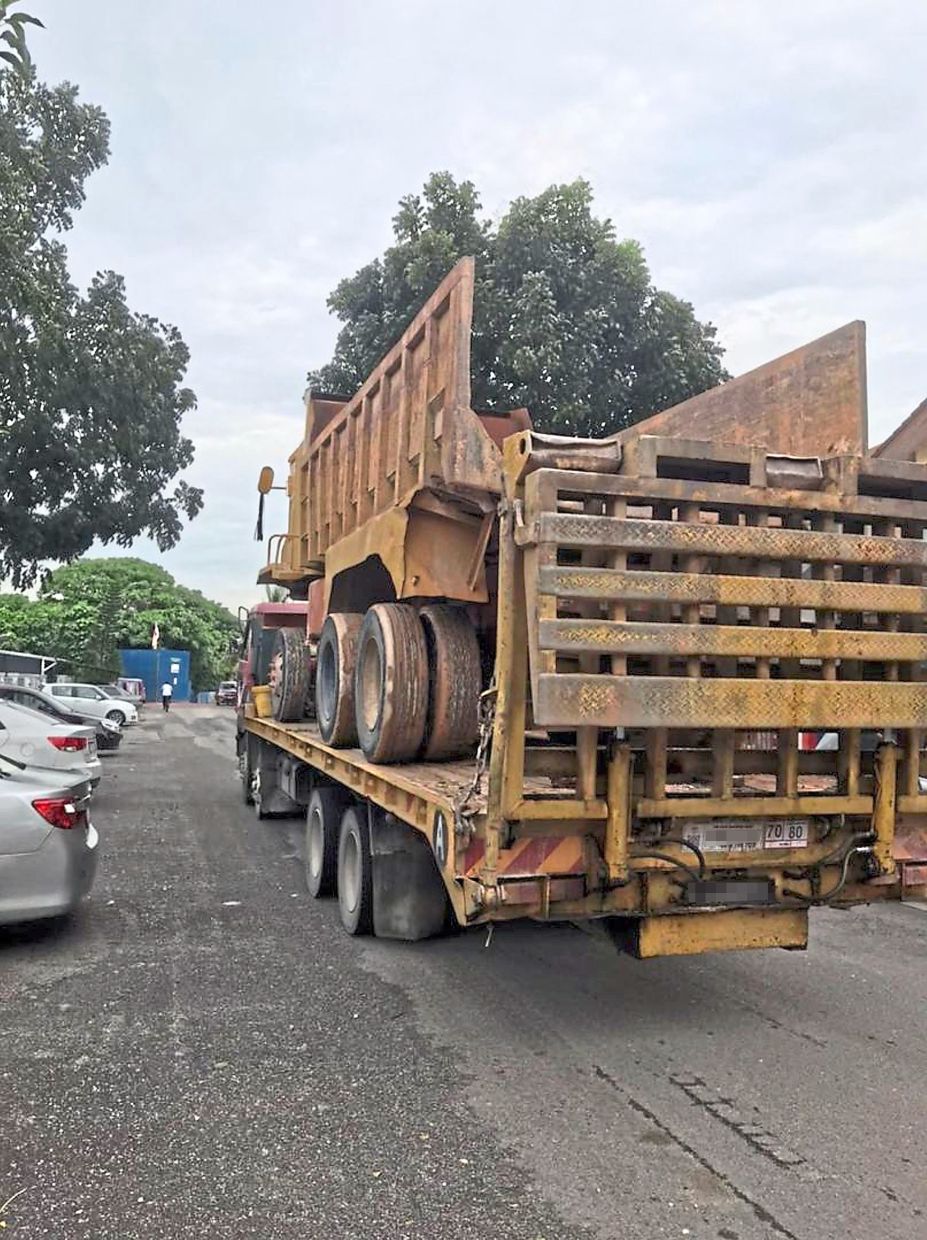 One of the numerous heavy vehicles using a road in Puchong Prima.