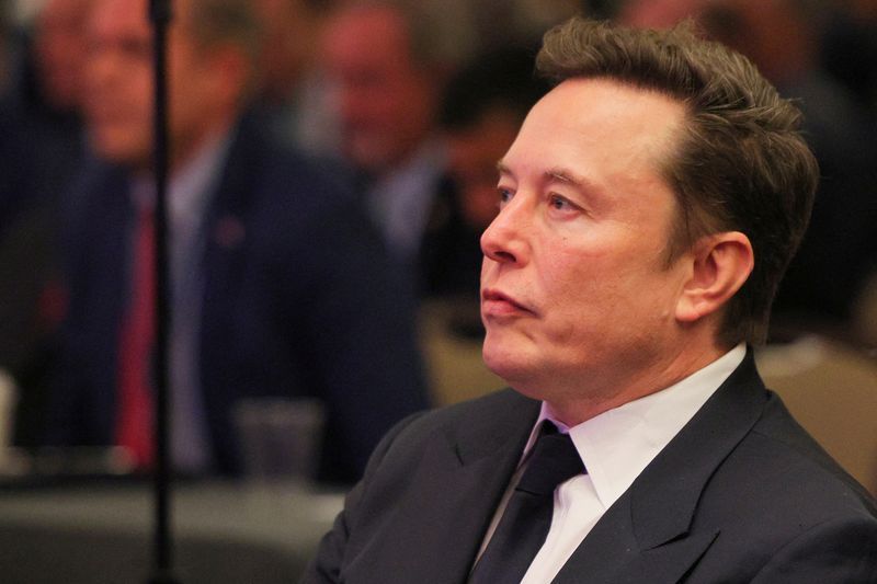 FILE PHOTO Tesla CEO and X owner Elon Musk sits as U.S. President-elect Donald Trump meets with House Republicans on Capitol Hill in Washington U.S. November 13 2024. REUTERSBrian SnyderFile Photo