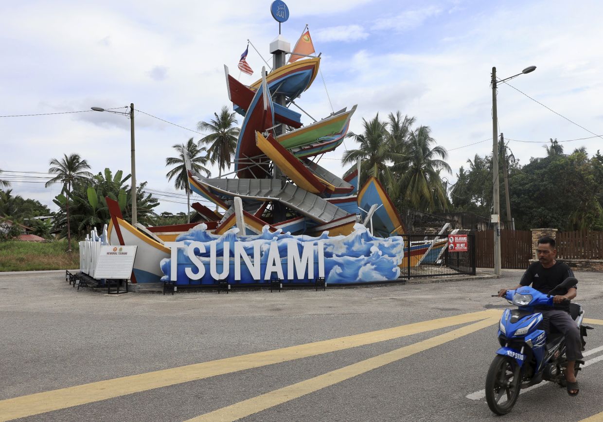 Tugu Sampan, or the Kota Kuala Muda Tsunami Memorial, built using 26 replica fishing boats in Kota Kuala Muda, Kedah. - ZHAFARAN NASIB/The Star