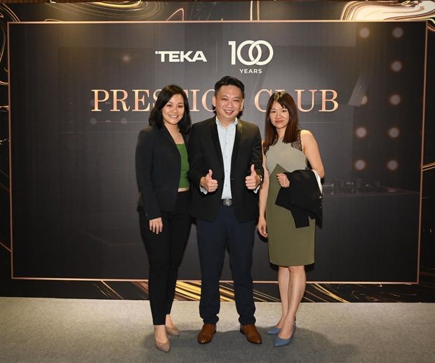 Fong (centre) with his project manager Bernice Tan (left) and assistant project manager Samantha Chong celebrating Teka Prestige Club and the home appliances provider’s 100th anniversary.