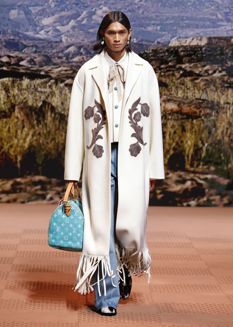 Cowboy looks are huge in 2024. Pictured here is Malaysian model Ridzman Zidaine opening the runway show at Paris Fashion Week. Photo: Louis Vuitton