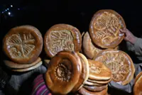 Afghan bread, or naan, the humble centrepiece of every meal