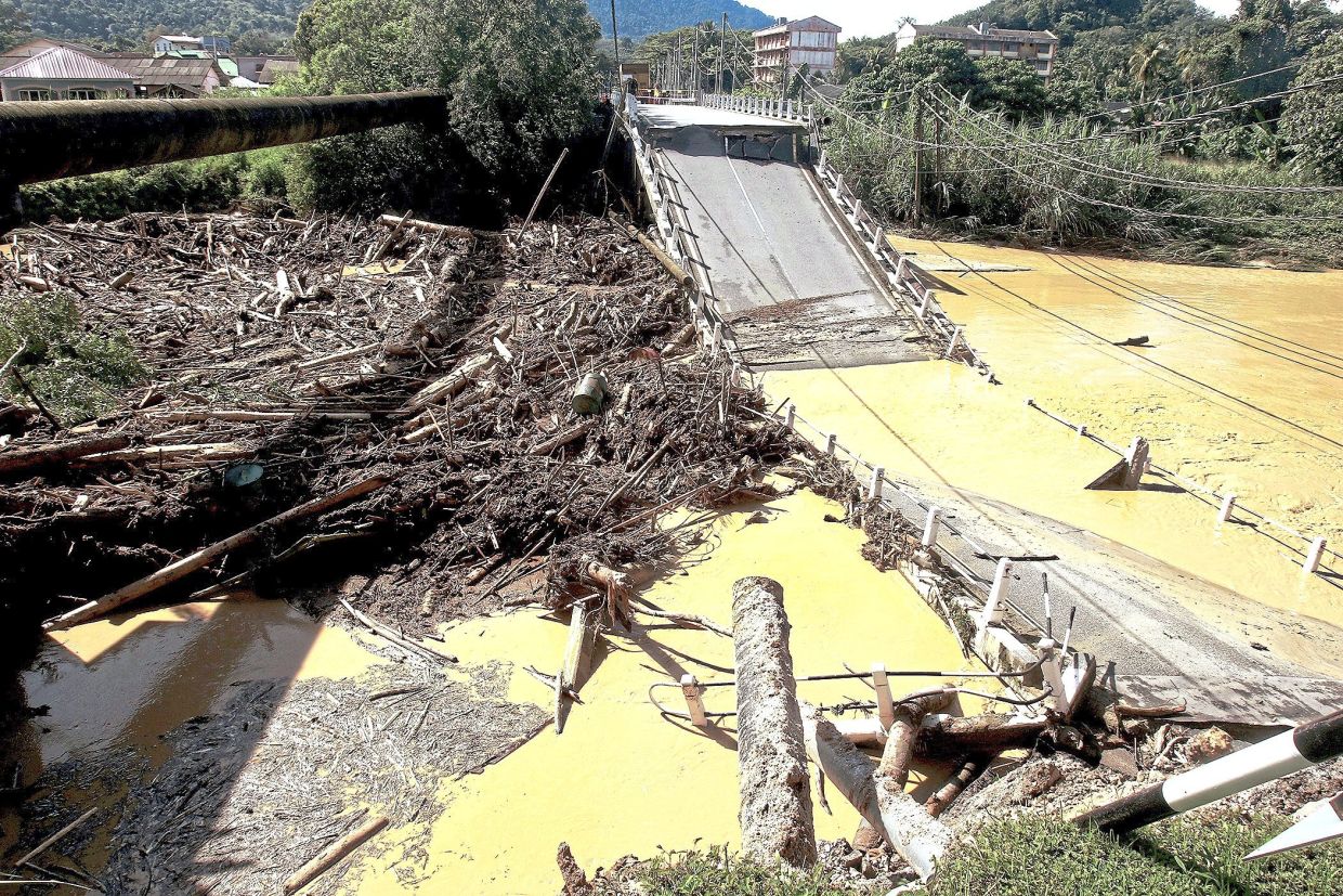 The Slim River bridge which was destroyed by a water surge.
