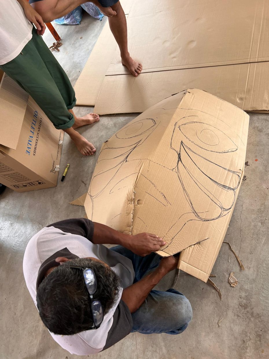 Besides the giant puppets, residents will also dress up in masks representing smaller characters for the 'Awas! Mawas!' parade. Photo: William Koong