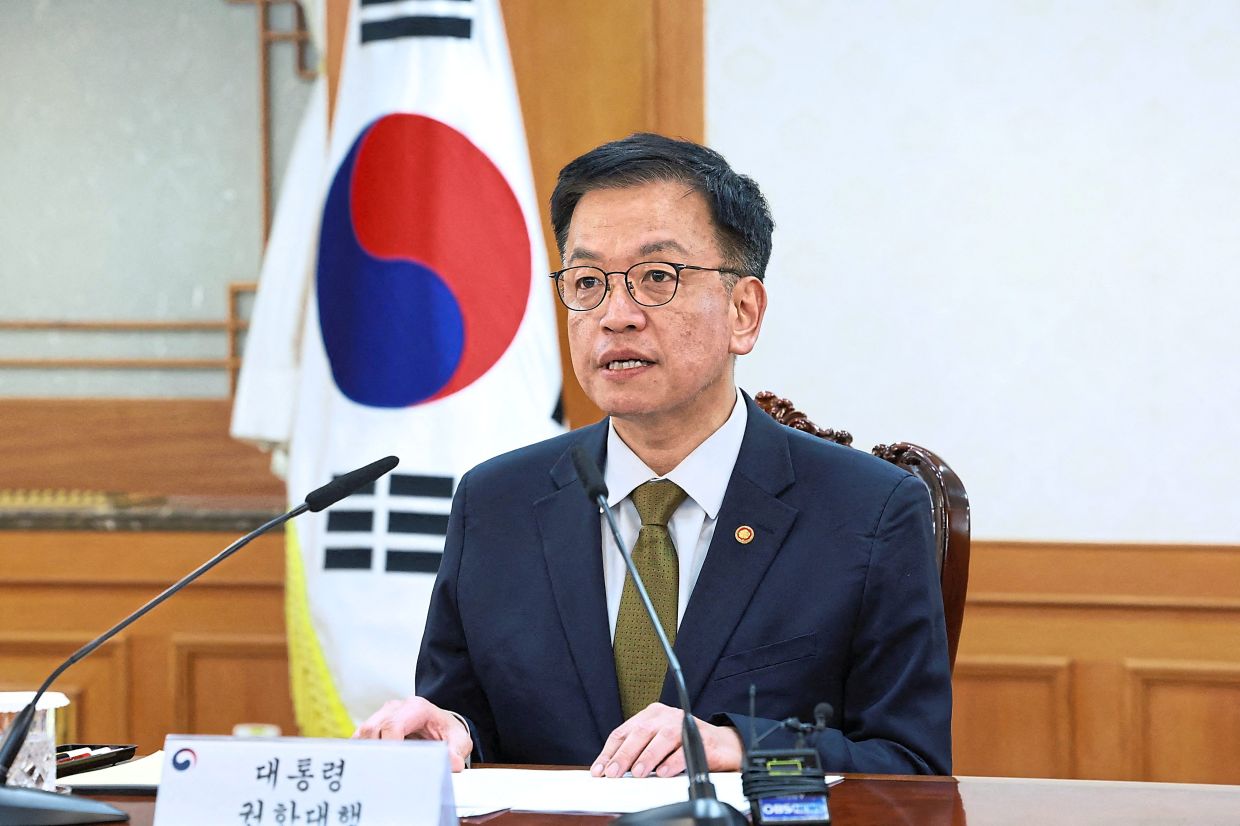 Choi presiding over the National Security Council at the government complex in Seoul.