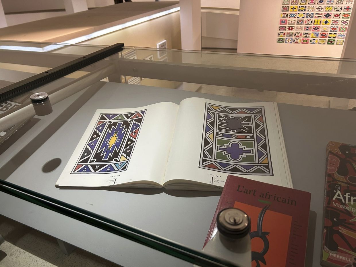 The exhibition at the Wits Art Museum spans seven decades and features over 100 artworks, including the iconic BMW Art Car, beadwork, painted mannequins and a TV. Photo: AP 