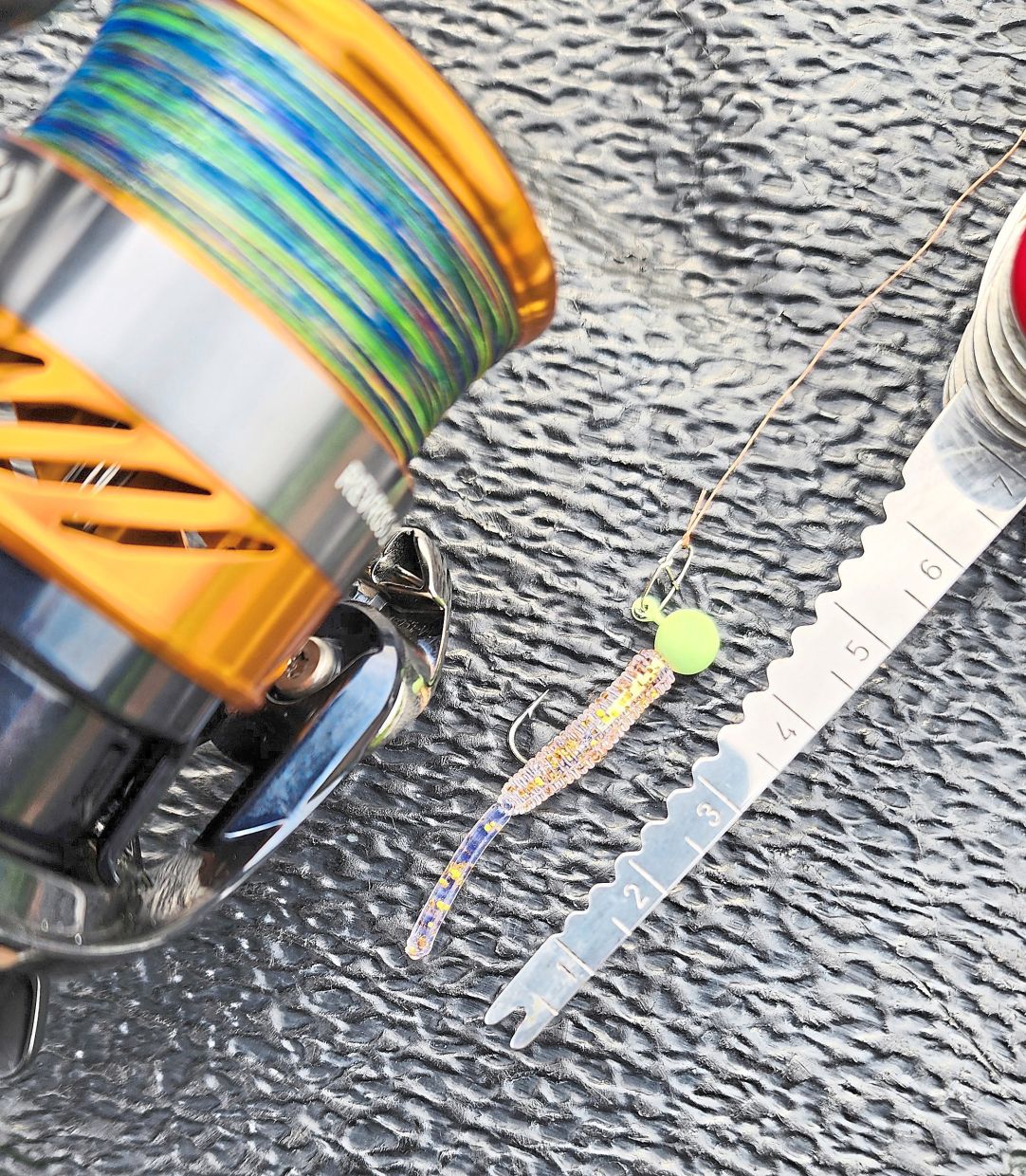  A 1g jighead fitted with a tiny soft plastic grub.