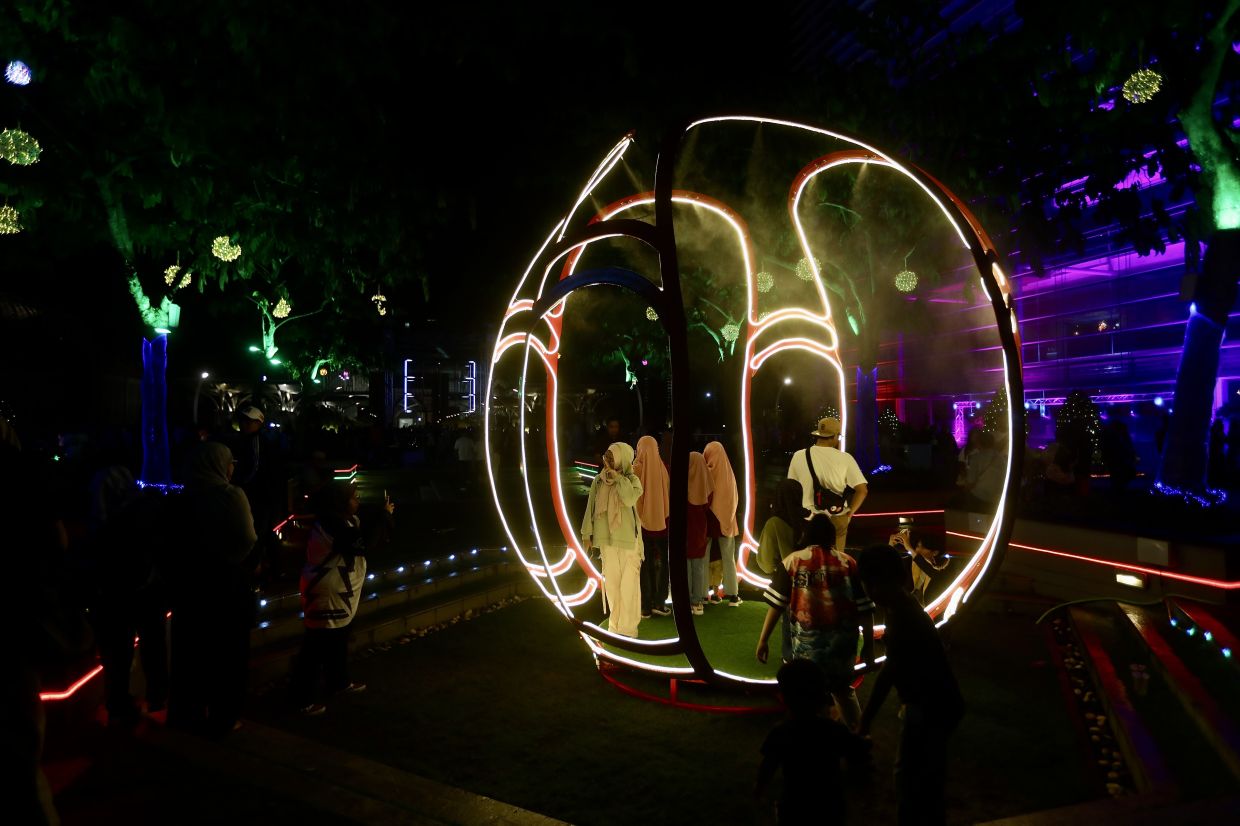 Since Dec 27, 'Lampu 2024' has bathed Putrajaya in a captivating nightly glow, transforming the city with its vibrant displays and stunning light installations. Photo: The Star/Shaari Chemat