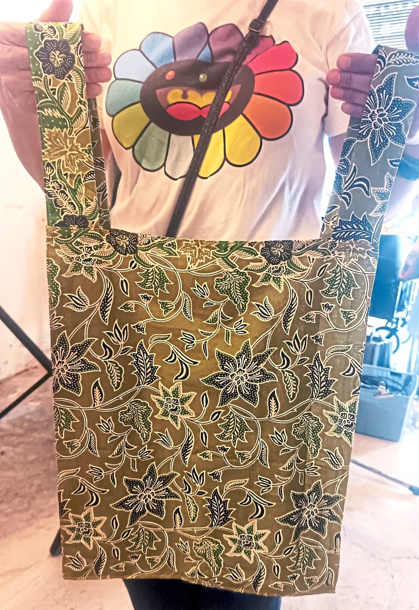 Leong turns batik fabric waste into functional products such as shopping bags and finds the work therapeutic.