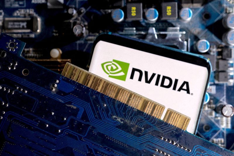 FILE PHOTO A smartphone with a displayed Nvidia logo is placed on a computer motherboard in this illustration taken March 6 2023. REUTERSDado RuvicFile Photo