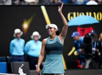 Tennis-Swiatek locks in Keys semi-final, Sinner sizzles at Australian Open