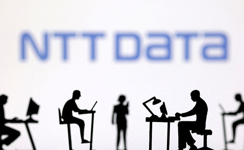 FILE PHOTO Figurines with computers and smartphones are seen in front of NTT DATA logo in this illustration taken February 19 2024. REUTERSDado RuvicIllustrationFile Photo
