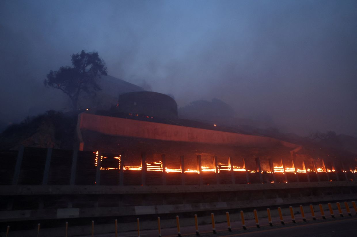 A fire burns at the Getty Villa during a wildfire in the Pacific Palisades neighbourhood of west Los Angeles, California on Jan 7. Photo: Reuters