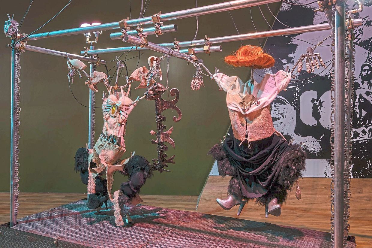 The displays include costumes from her film that is part of the exhibition.