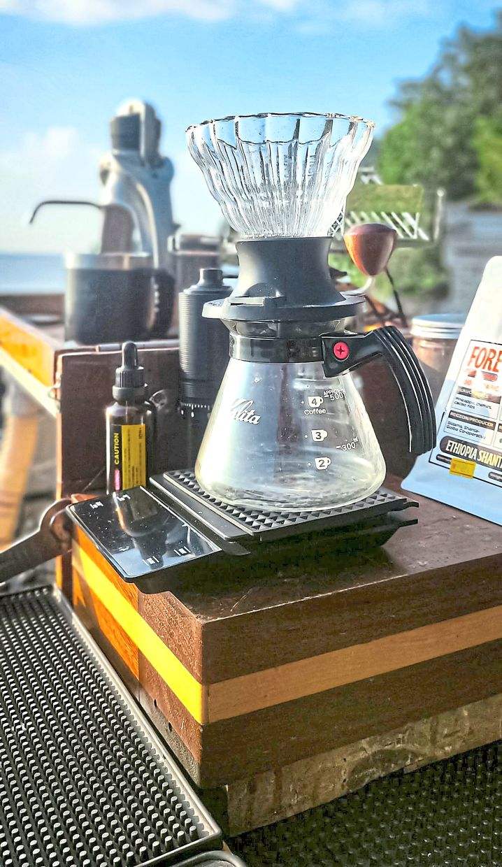 At the base of the coffee dripper is an electronic scale, with which Wanel uses to pour exactly 250ml of hot water to make the perfect cuppa.