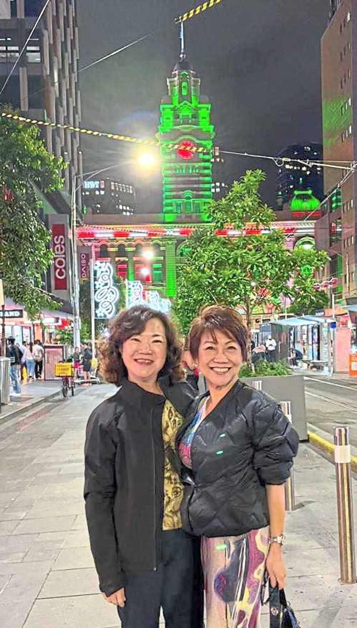 See (left) with Khoo during a recent holiday.