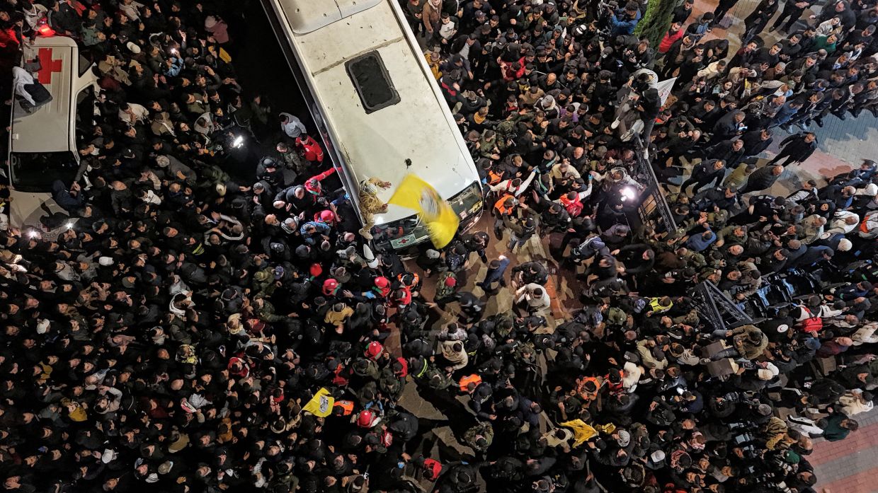A drone view of people gathering during the arrival of the freed Palestinian prisoners, after they were released from an Israeli jail as part of a hostages-prisoners swap and a ceasefire deal in Gaza between Hamas and Israel, in Ramallah, in the Israeli-occupied West Bank, January 30, 2025. REUTERS/Stringer