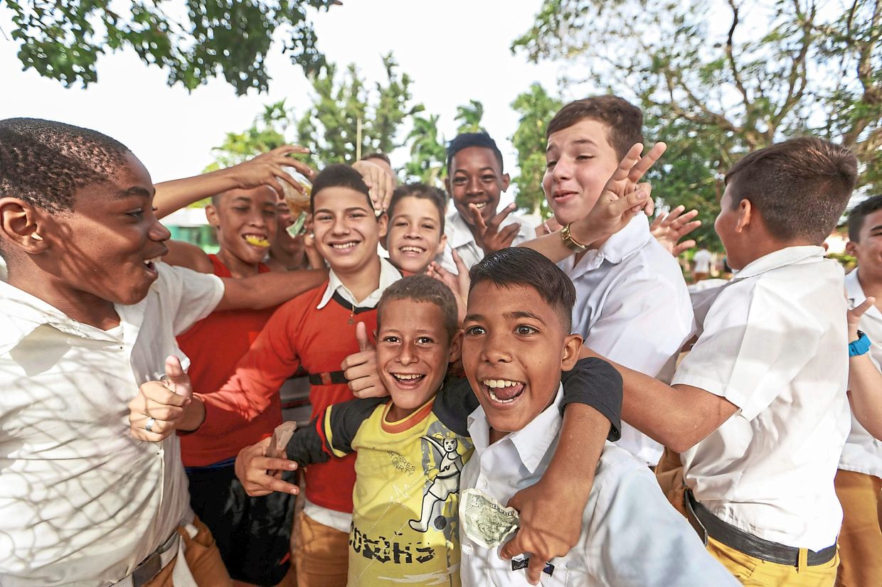Children should grow up in a safe environment where they feel happy, loved and valued. — Pexels