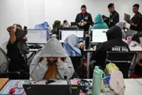 Philippines arrests 100 suspects in online scam farm raid