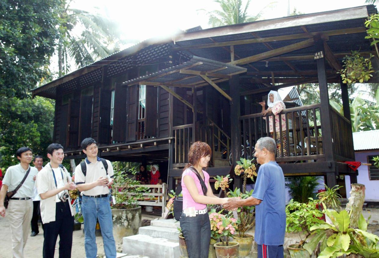 The architecture of a traditional kampung house is also an attraction.— Filepic/The Star