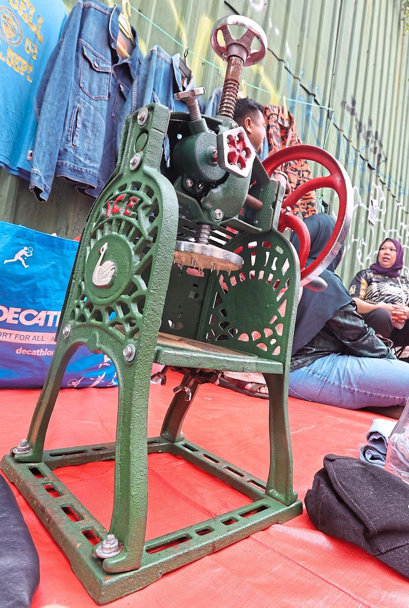 A machine used to make shaved ice or ABC, is among items that can be found at the market.