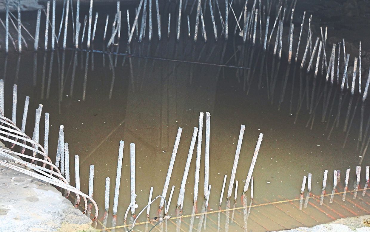 A pool of stagnant water raises concerns that the area can turn into a breeding ground for Aedes mosquitoes.