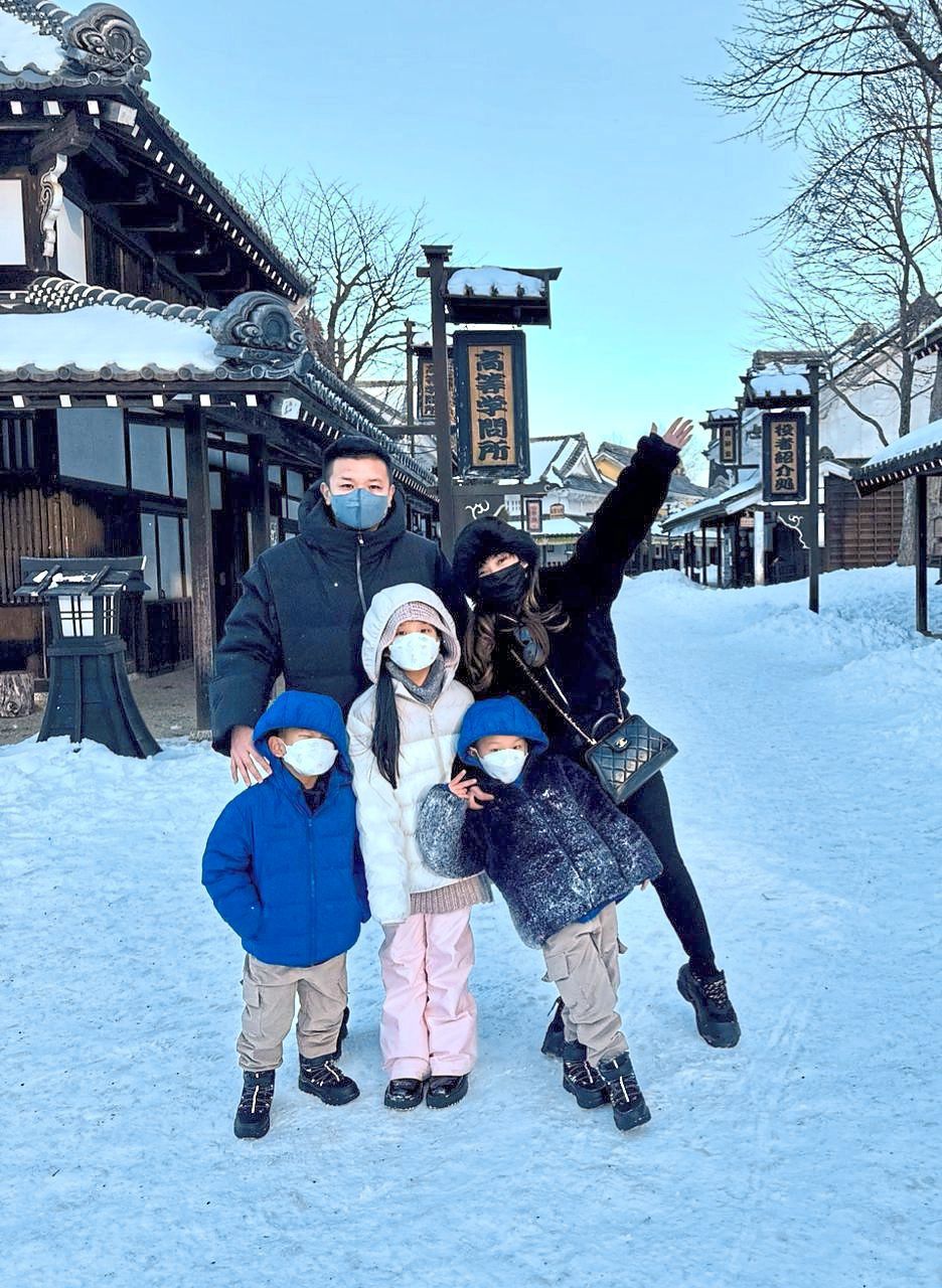 Accountant Tan Phei Wen (right) and her family donning face masks to stay safe while holidaying in Japan. They are seen here at the Noboribetsu Village in Hokkaido.