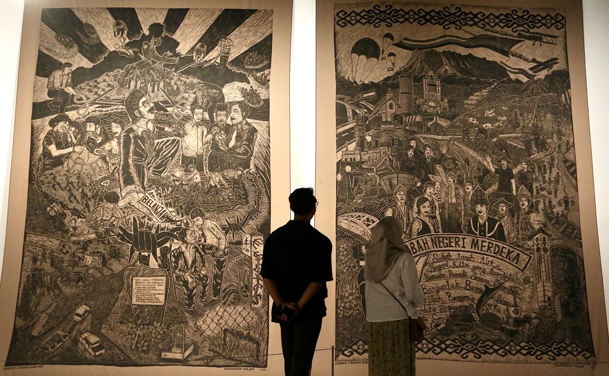 Pangrok Sulap’s 'Sabah Tanah Air-Ku' series is on display at 'Nusa', the National Art Gallery’s exhibition in Kuala Lumpur. Showcasing the national collection, 'Nusa' offers a unique and arty way to spend Valentine’s Day. Photo: The Star/Faihan Ghani 