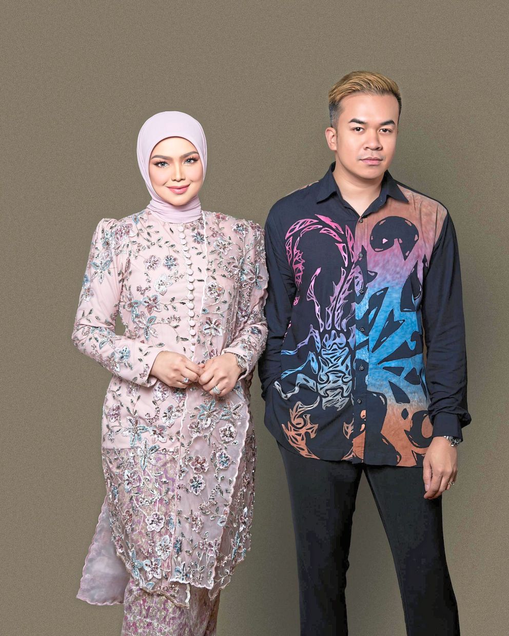 Siti Nurhaliza is among Ezuwan Ismail’s most notable clientele. In this picture, she wears his design created specifically for the Biduanita Negara ceremony last year. Photo: Ezuwan Ismail
