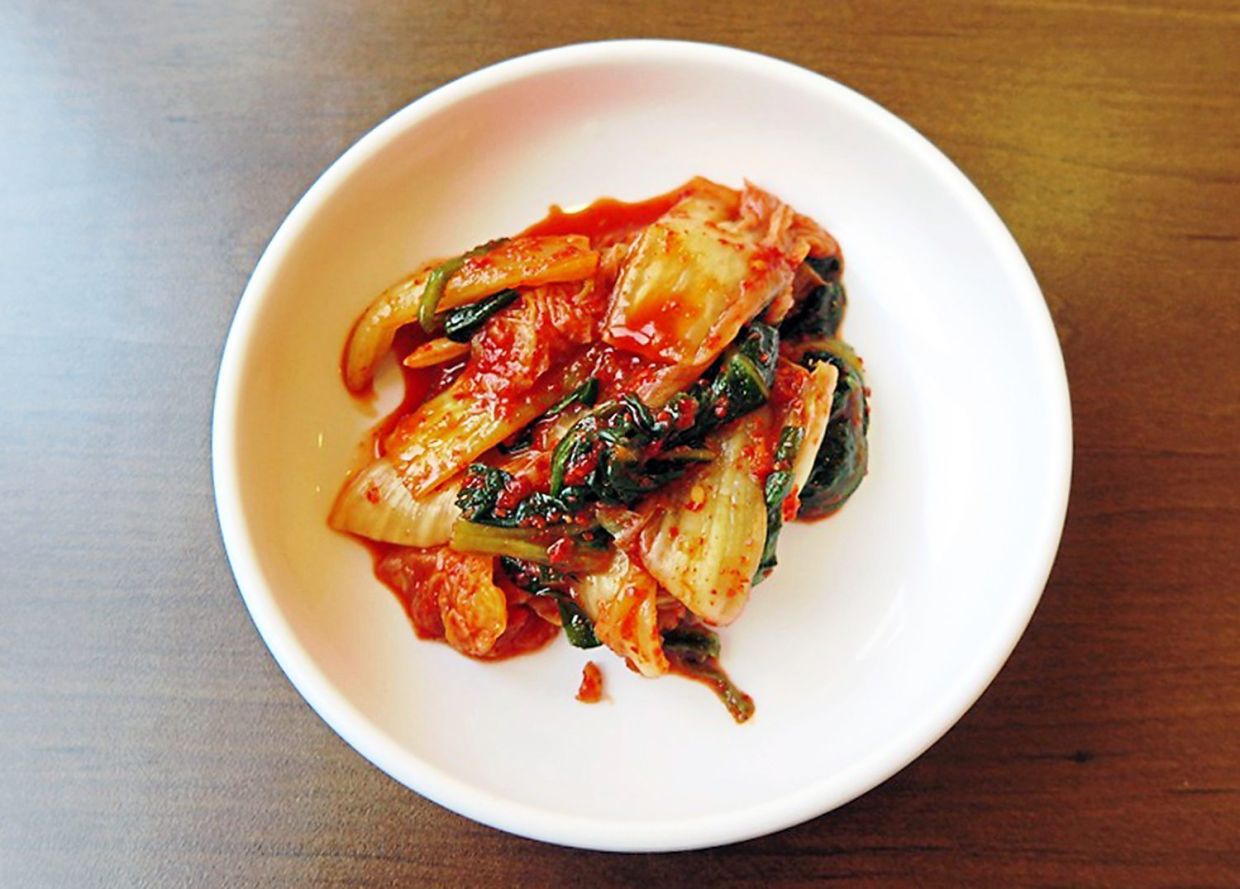 Kimchi, the spicy fermented Korean vegetable side dish, offers both taste and health benefits. — dpa