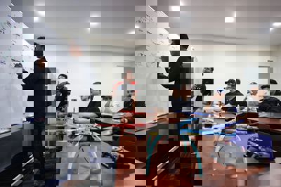 Participants attending theory class training with their trainer, Muhizee Sahat for the Remote Pilot Certificate of Competency (RCoC) at the Asia Drone Technical Academy in Kuala Lumpur on February 21, 2024. The Civil Aviation Authority of Malaysia (CAAM) recently mandated that all drone operators must obtain a permit before flying. — GLENN GUAN/The Star