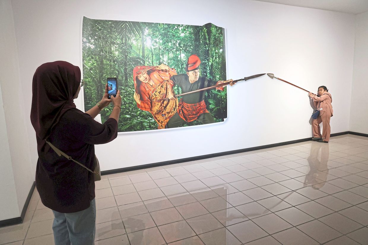 Visitors enjoying an interactive artwork. 