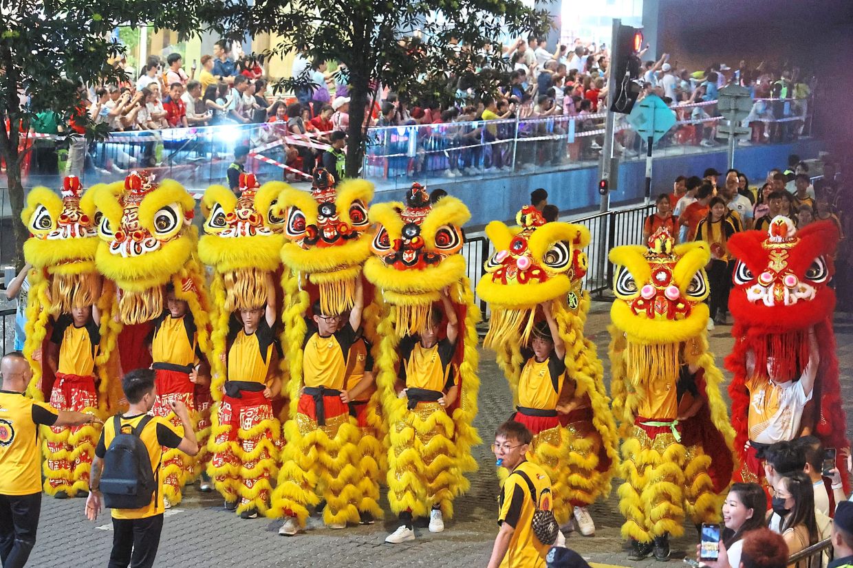 Lion dances are a staple feature during the procession.